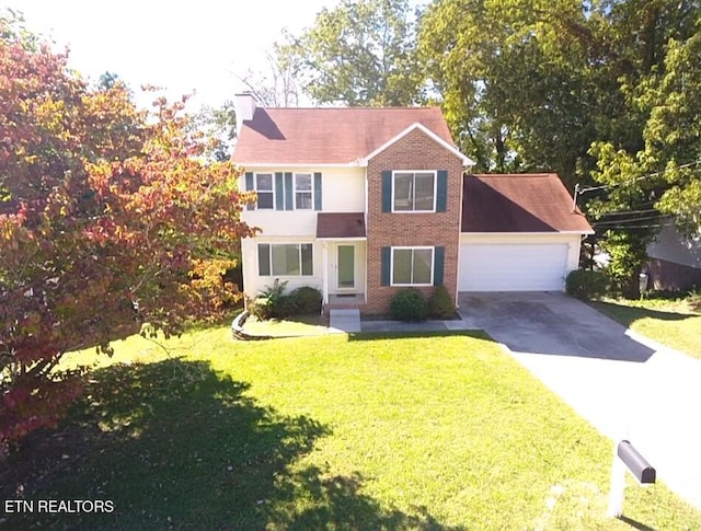 1432 Pheasants Glen Dr, Knoxville, TN 37923 - view of front of home with a garage, driveway, a chimney, and a front yard