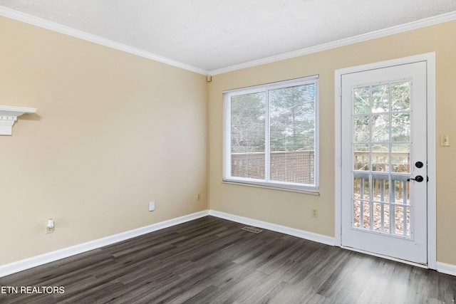 1432 Pheasants Glen Dr, Knoxville, TN 37923 - empty room featuring ornamental molding, baseboards, visible vents, and dark wood finished floors