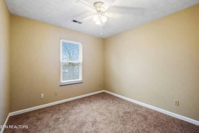 1432 Pheasants Glen Dr, Knoxville, TN 37923 - carpeted empty room featuring ceiling fan, a textured ceiling, baseboards, and visible vents