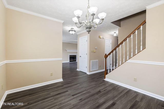 1432 Pheasants Glen Dr, Knoxville, TN 37923 - unfurnished dining area featuring a notable chandelier, visible vents, dark wood-style flooring, baseboards, and stairway