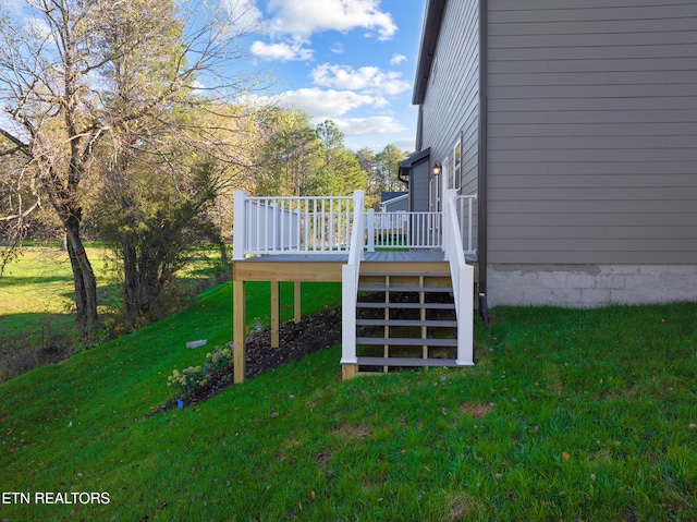 view of yard with a wooden deck