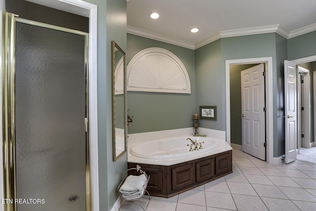 bathroom with tile patterned floors, a shower stall, a bath, and crown molding