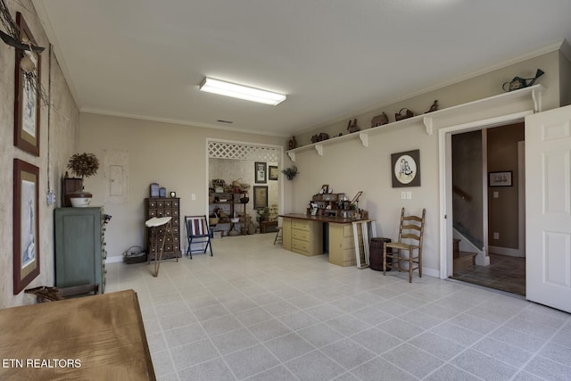 interior space with stairs, baseboards, and ornamental molding