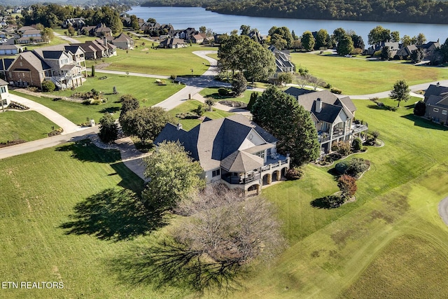 aerial view featuring a water view and a residential view