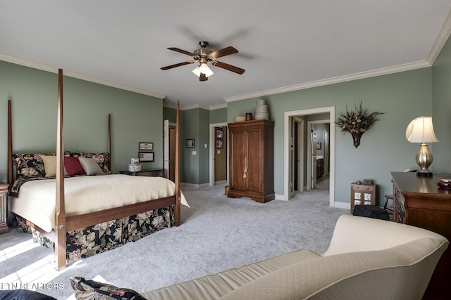 bedroom featuring a ceiling fan, baseboards, light colored carpet, and crown molding