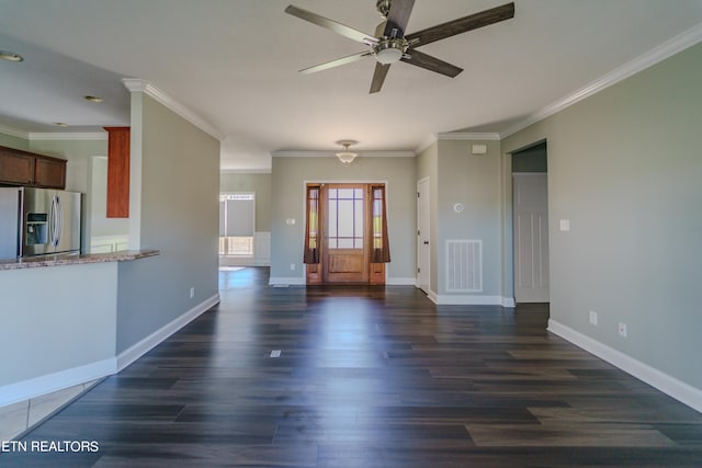 unfurnished living room featuring ceiling fan, dark hardwood / wood-style floors, and ornamental molding