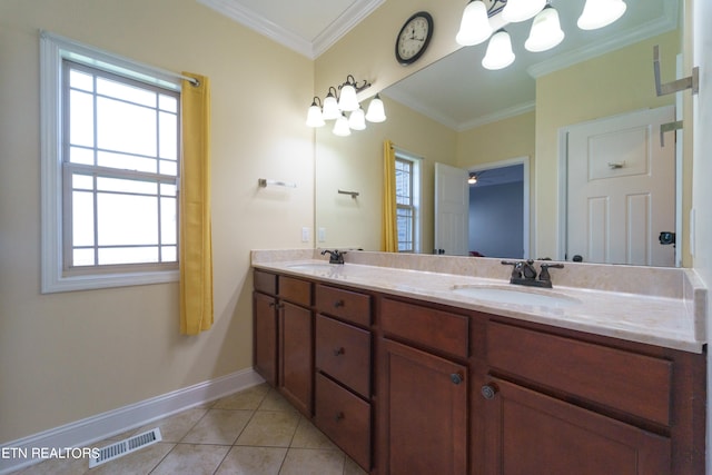 bathroom with tile patterned floors, crown molding, and vanity