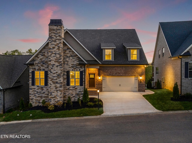 view of front of property with a garage