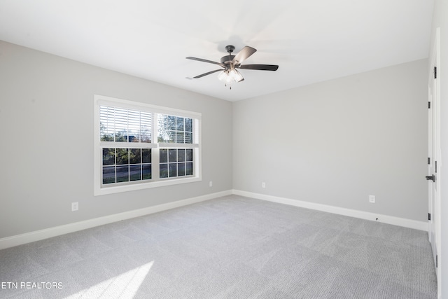 unfurnished room featuring carpet floors and ceiling fan