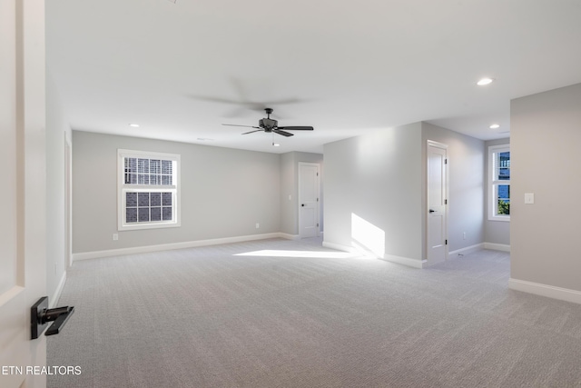 unfurnished room featuring light carpet, baseboards, recessed lighting, and ceiling fan