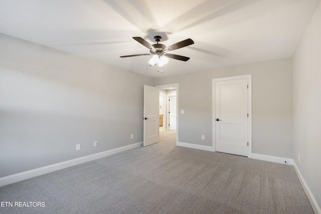 unfurnished bedroom with light carpet and ceiling fan