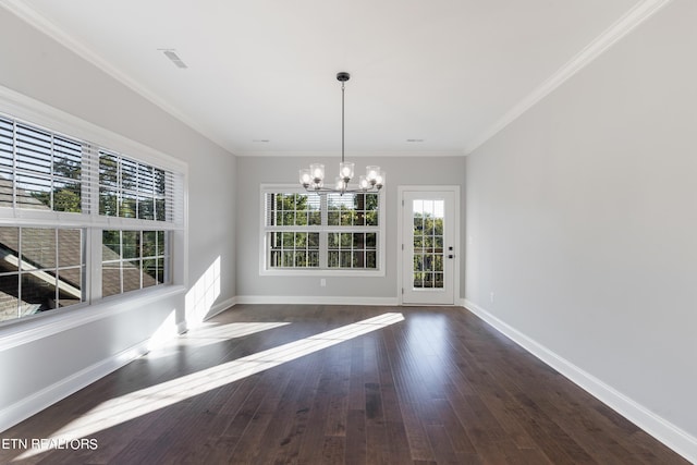 unfurnished dining area featuring ornamental molding, baseboards, a notable chandelier, and dark wood-type flooring