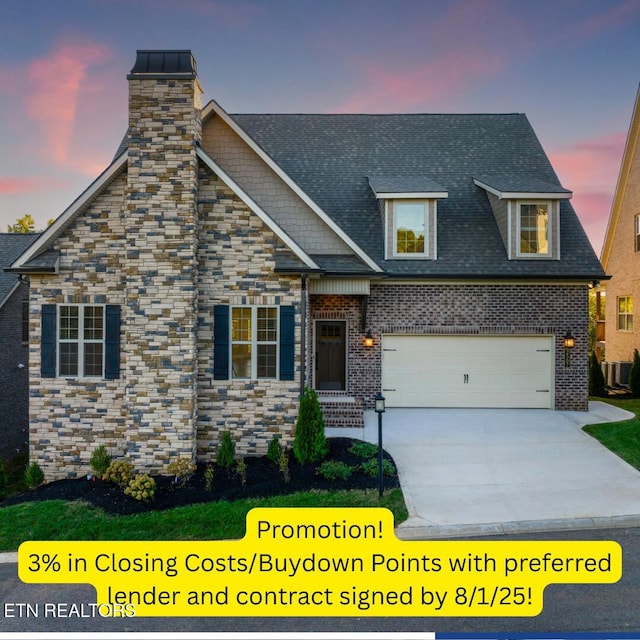 2507 Mishas Meadow Way, Knoxville, TN 37932 - view of front facade featuring driveway, a chimney, and a shingled roof