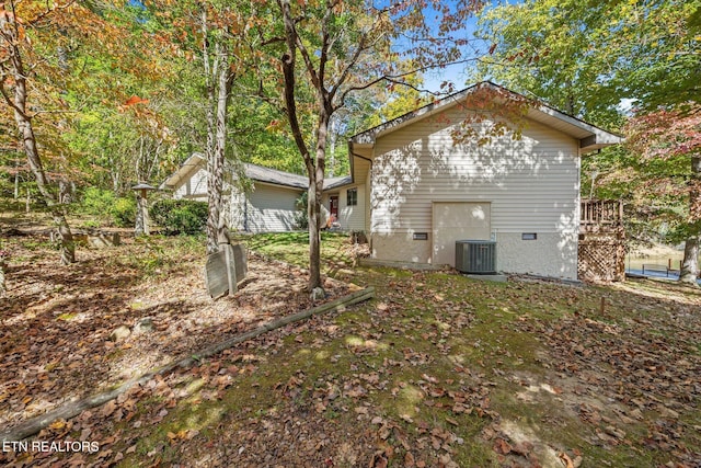 view of property exterior with cooling unit