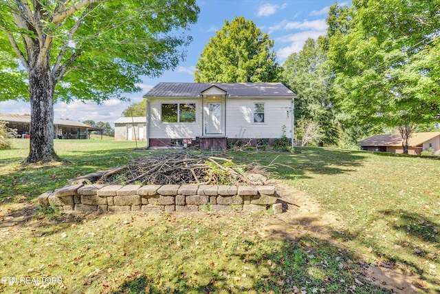 exterior space with a front yard