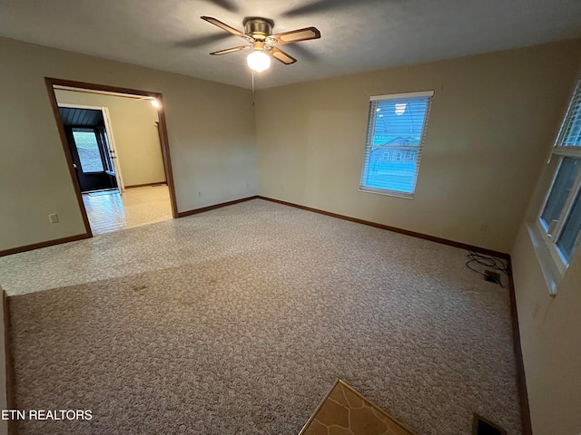 unfurnished room featuring ceiling fan