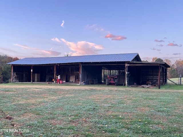 view of outdoor structure at dusk