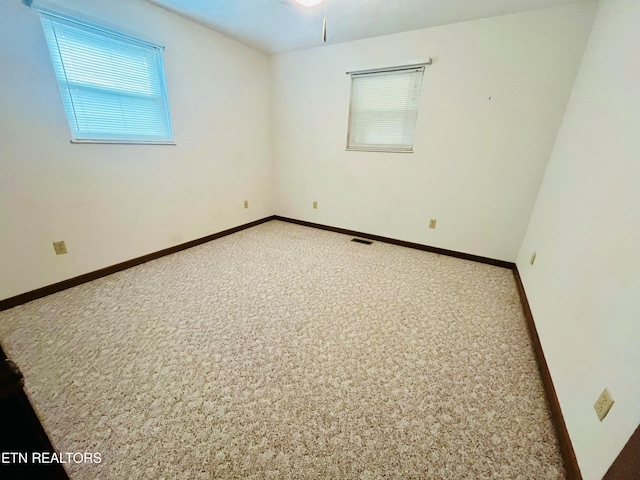 empty room featuring carpet