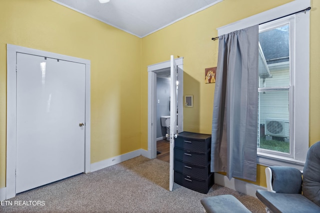 living area with carpet floors and cooling unit