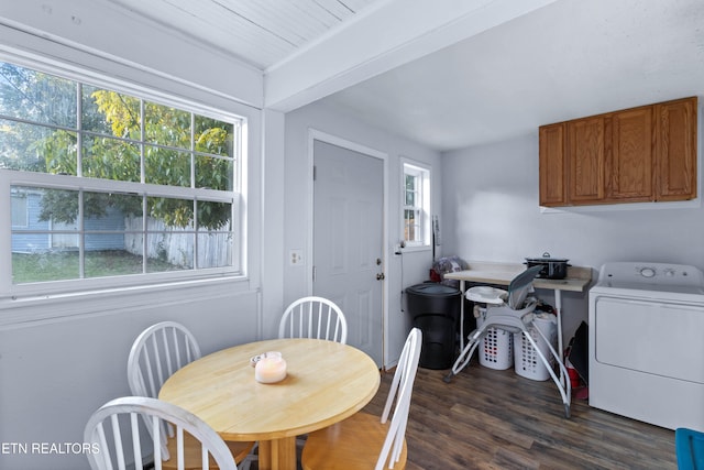 dining room with washer / clothes dryer and dark wood-type flooring