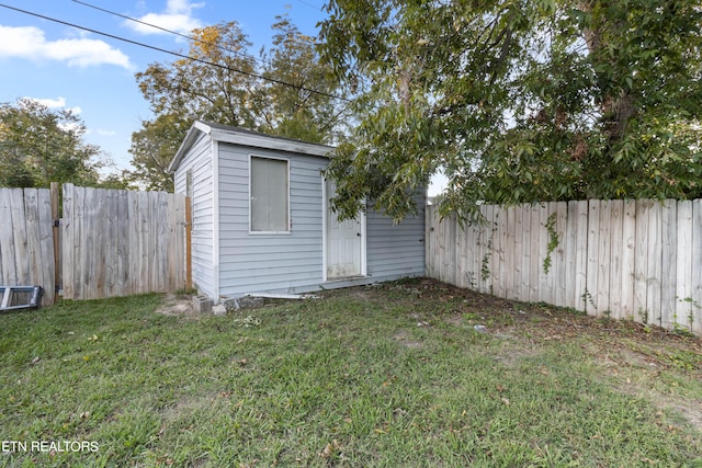 exterior space featuring a shed