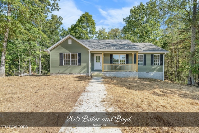 ranch-style house with covered porch