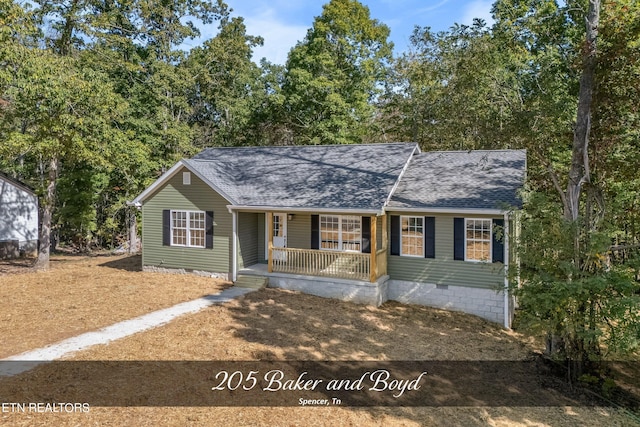 single story home featuring a porch