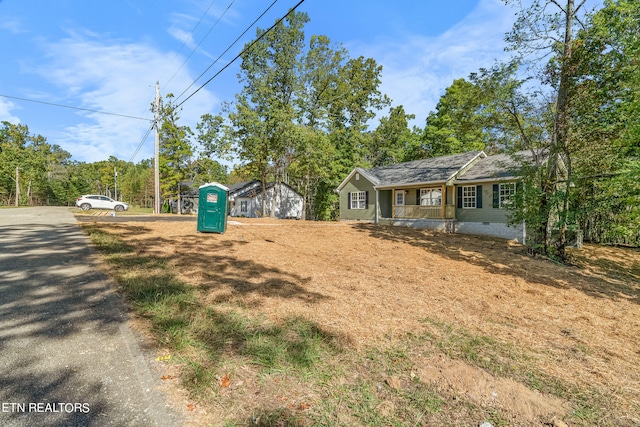 view of yard featuring a porch