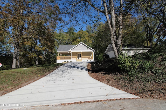 view of front of home featuring covered porch