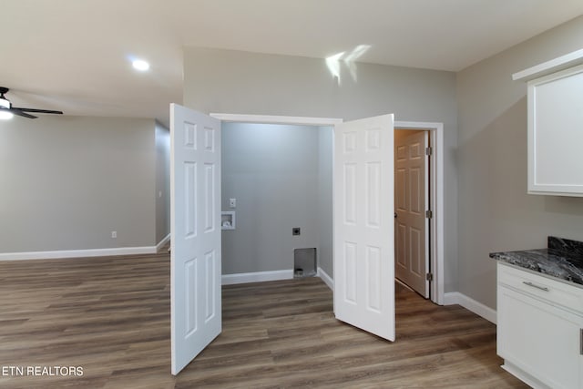 clothes washing area featuring dark wood-type flooring, ceiling fan, hookup for an electric dryer, and hookup for a washing machine