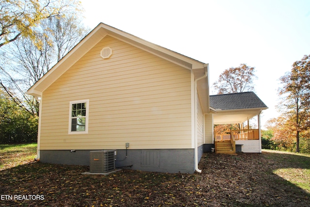 view of home's exterior featuring central AC