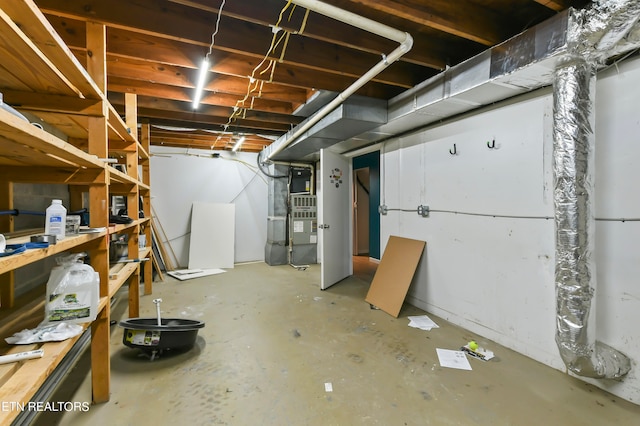 basement featuring heating unit