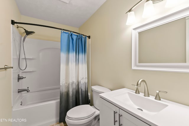 full bathroom featuring vanity, shower / tub combo, and toilet