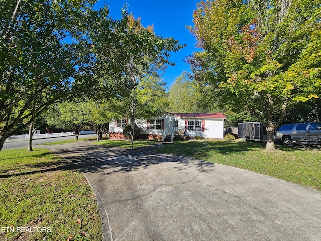 view of front of home with a front yard