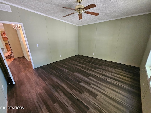 unfurnished room featuring crown molding, dark hardwood / wood-style floors, ceiling fan with notable chandelier, and a textured ceiling