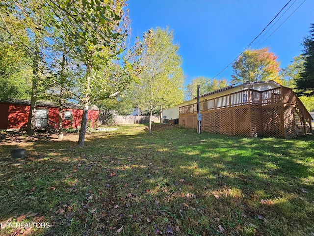 view of yard with a deck