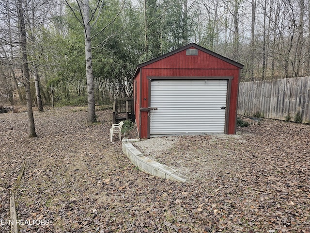 view of outbuilding with a garage