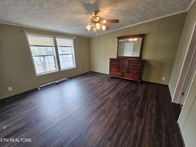 interior space with ornamental molding, dark wood-type flooring, a textured ceiling, and ceiling fan