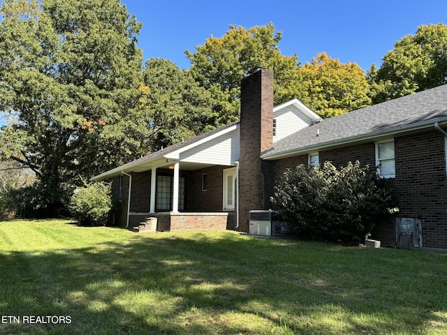 exterior space with a yard