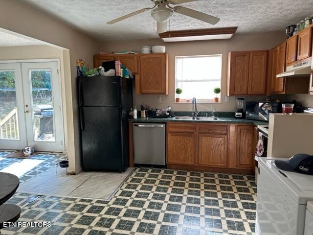 kitchen with ceiling fan, black refrigerator, sink, french doors, and stainless steel dishwasher