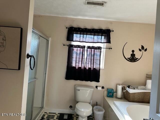 bathroom with plus walk in shower and toilet