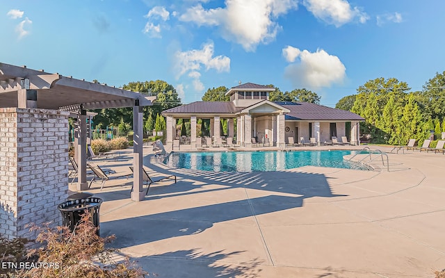 view of pool featuring a pergola and a patio