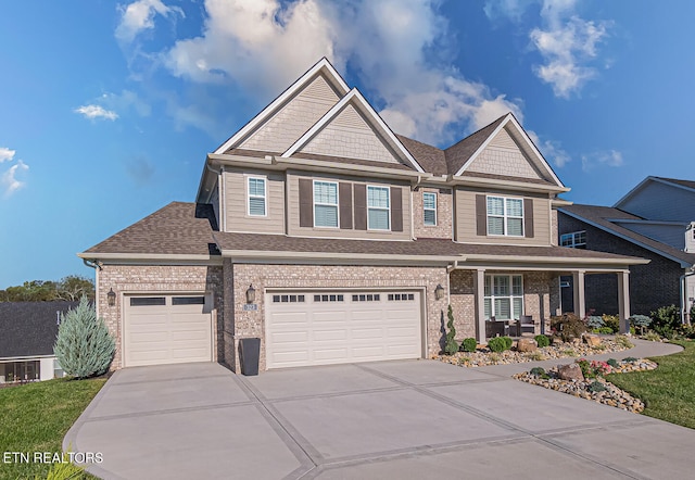 craftsman house featuring a garage