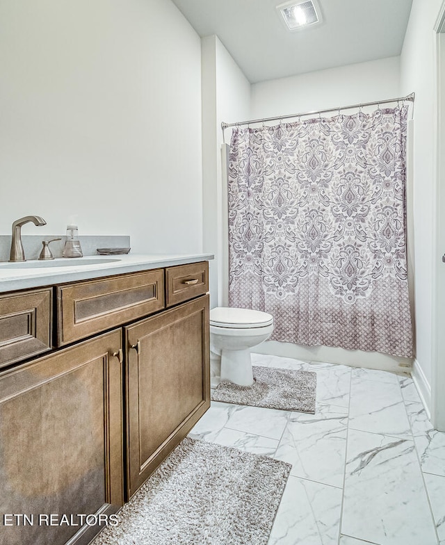 full bathroom featuring vanity, toilet, and shower / bathtub combination with curtain