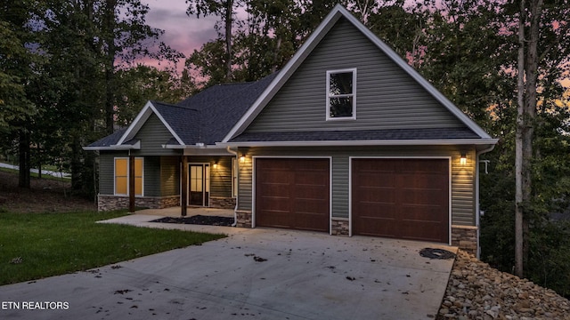 view of front of property featuring a garage