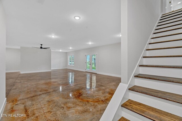 interior space featuring ceiling fan