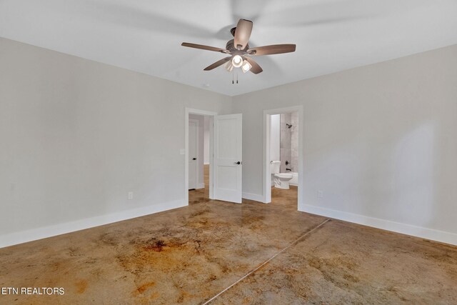 unfurnished bedroom featuring ceiling fan and connected bathroom