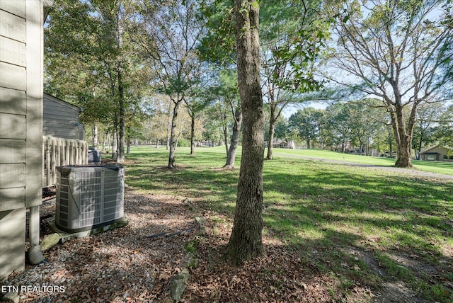 view of yard with central air condition unit