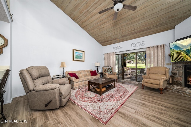 living room featuring ceiling fan, wooden ceiling, a fireplace, high vaulted ceiling, and hardwood / wood-style flooring