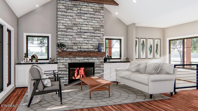 living room featuring wood-type flooring, a stone fireplace, high vaulted ceiling, and a healthy amount of sunlight